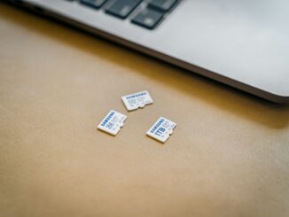 Laptop and mobile technology setup. Photo by Samsung Memory on Unsplash.