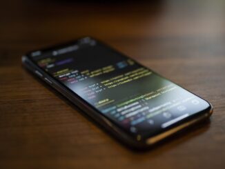 Person using a smartphone for mobile internet. Photo by Caspar Camille Rubin on Unsplash.