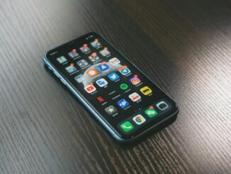 iPhone used for mobile internet and app access. Photo by Jonas Lee on Unsplash.