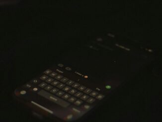 Smartphone used for internet and mobile data services. Photo by Di Nè! on Unsplash.