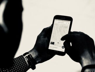 Smartphone showing location and mobile connectivity. Photo by X on Unsplash.