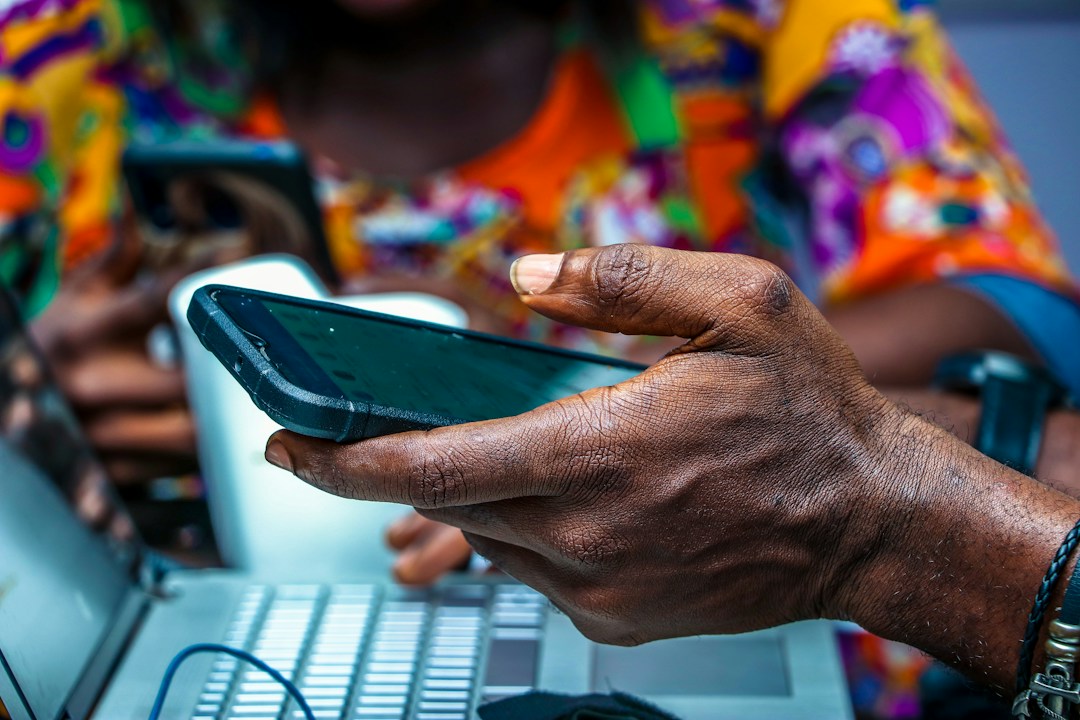 Person using a smartphone for mobile services